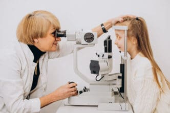 eye doctor with child patient