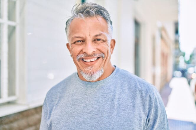 man smiling after cataract surgery