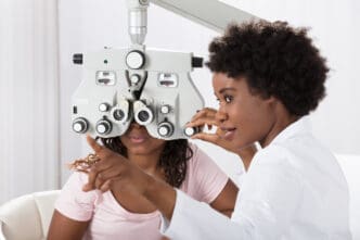 woman getting eye exam and vision testing