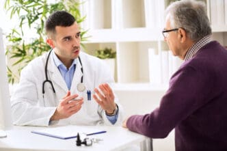 man talking with doctor