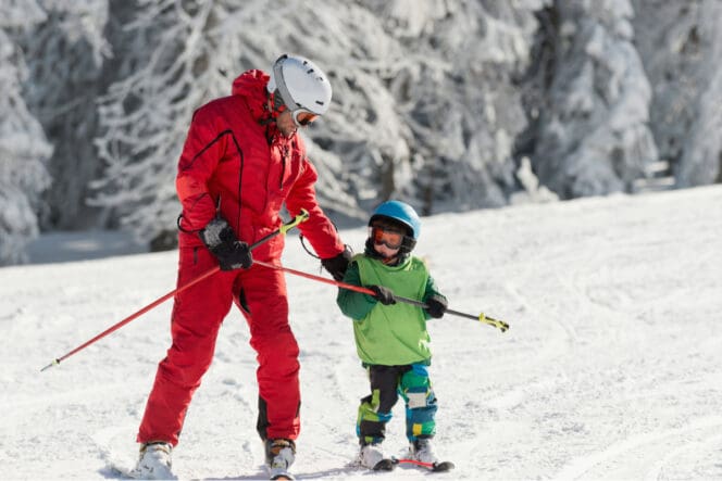 father and son skiing