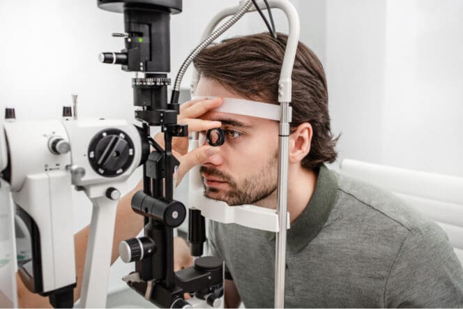 man getting retinal exam