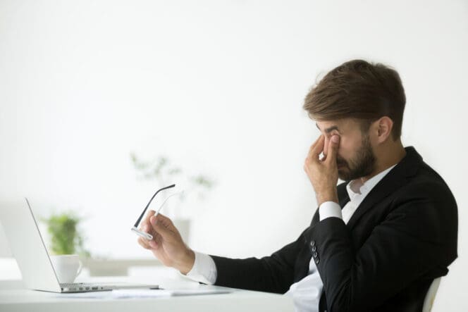 man with computer vision syndrome digital eye strain