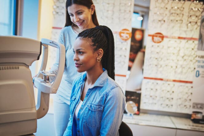 woman taking vision test