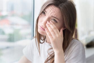 woman with eye allergies