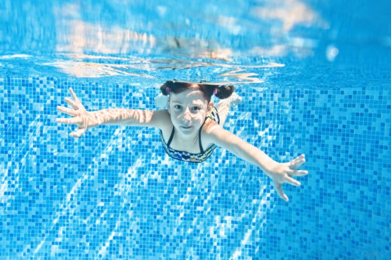 Should You Swim with Contacts In? Risks, Tips, and More